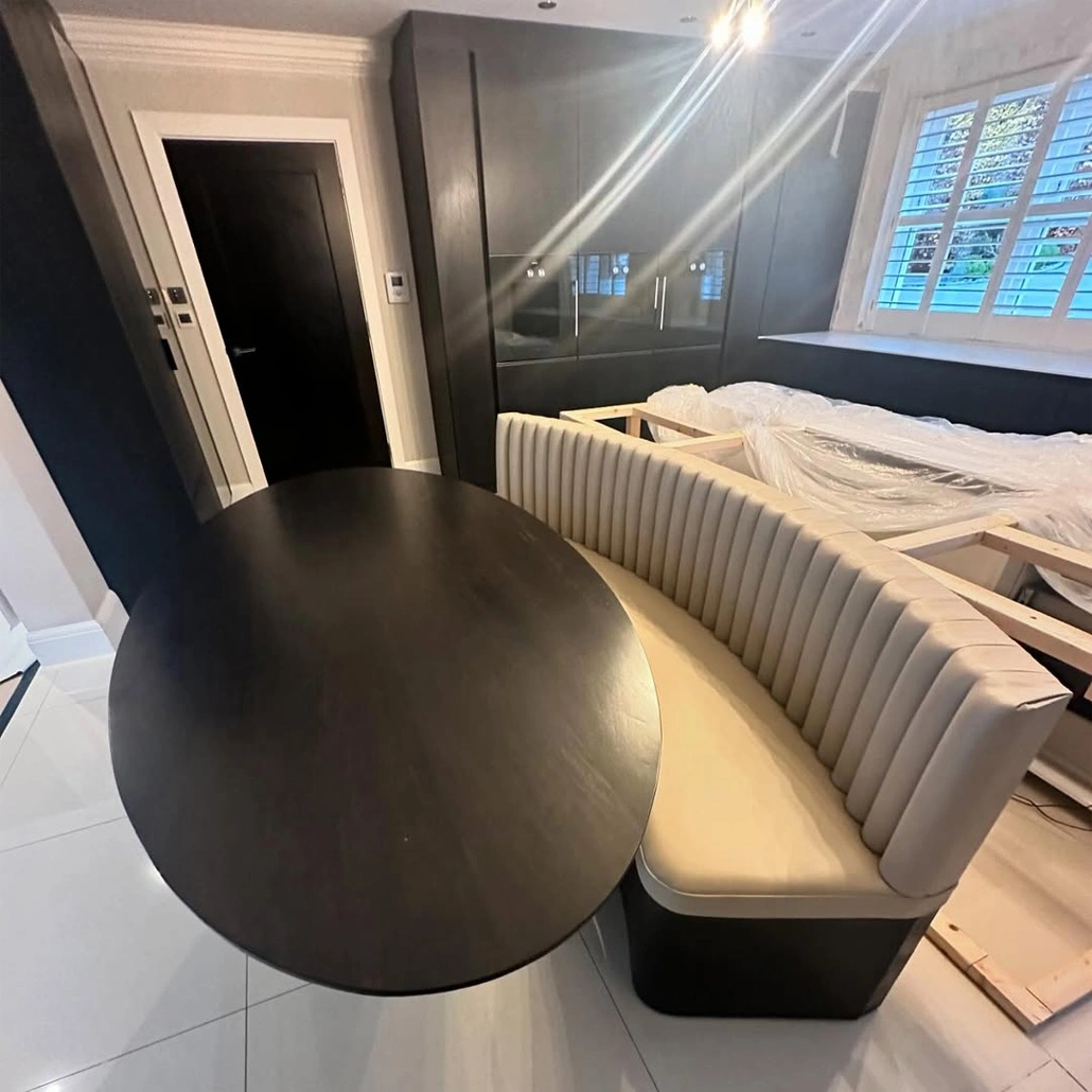 Bespoke stain & finish on Dining table / Bespoke banquet seating supplied in fluted style with faux leather finish. The Crown Estate, Oxshott, Surrey