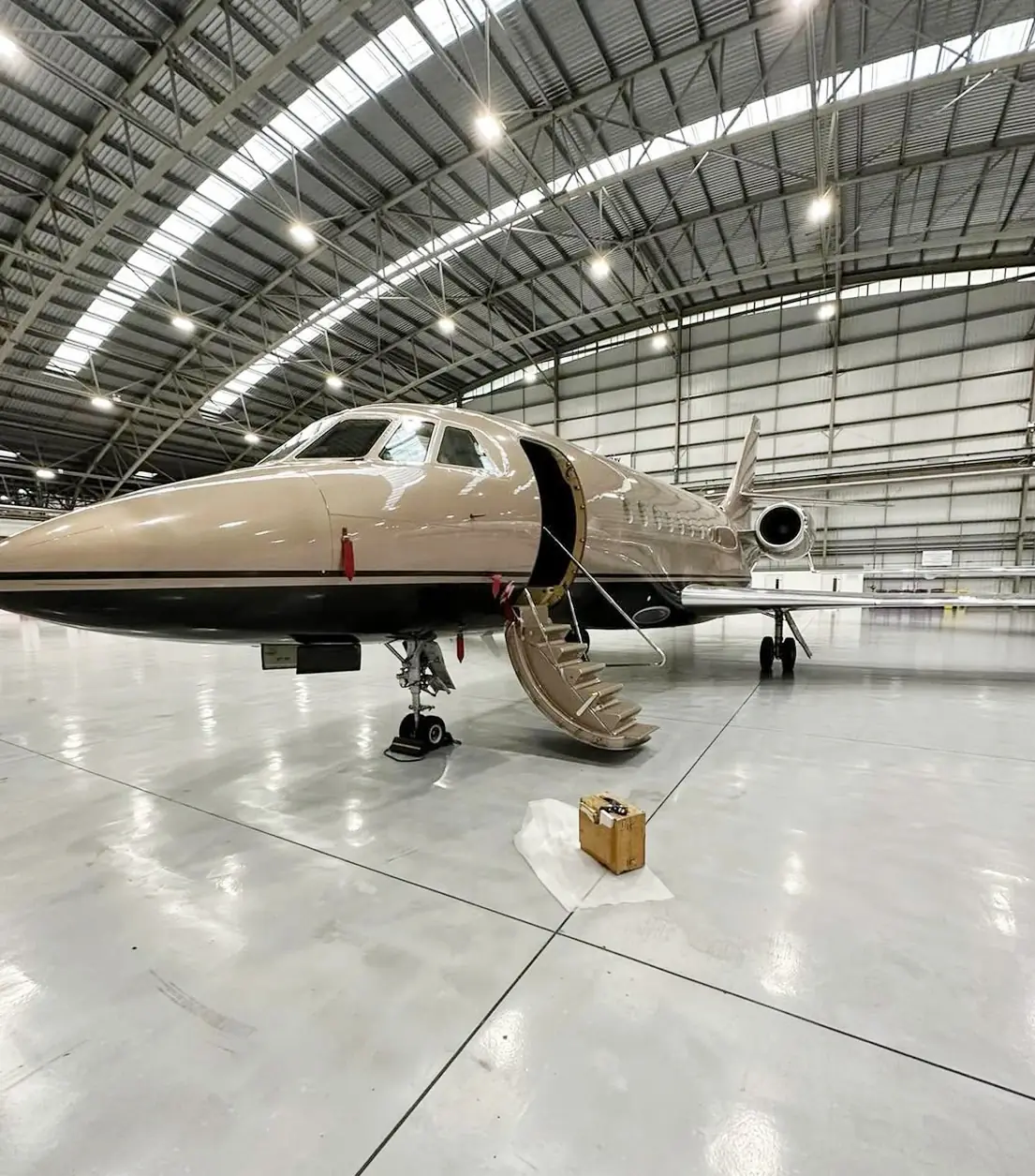 Airport private jet interior burr walnut joinery repaired and re-polished, Farnborough, Surrey
