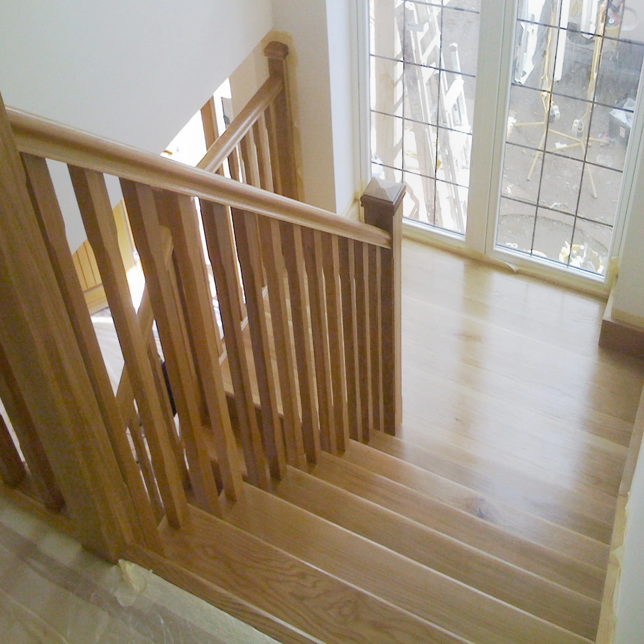 New oak staircase supplied and fitted by joinery company, polished to a natural satin finish